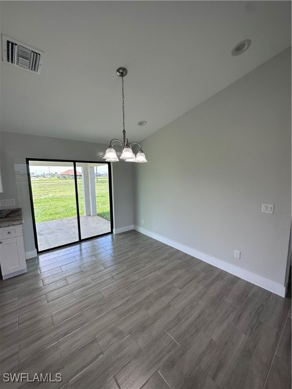 unfurnished dining area with hardwood / wood-style floors