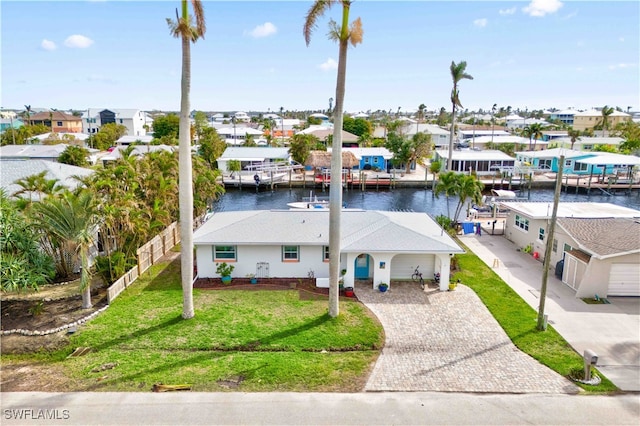 drone / aerial view with a water view