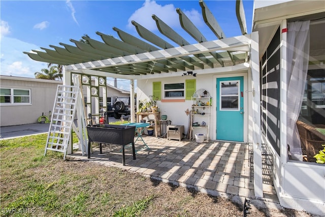 view of patio featuring a pergola