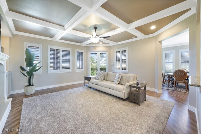 living room featuring beamed ceiling, ceiling fan, coffered ceiling, and hardwood / wood-style floors