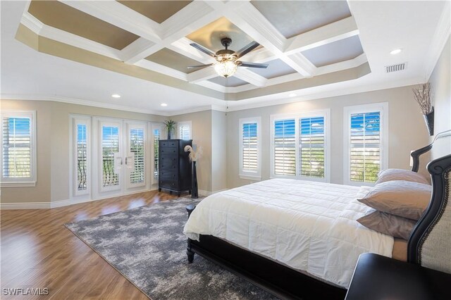 bedroom with wood-type flooring, coffered ceiling, access to exterior, and crown molding