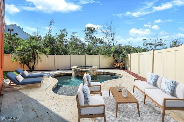 view of swimming pool with an in ground hot tub, pool water feature, an outdoor hangout area, and a patio