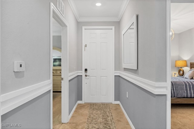 corridor featuring light colored carpet and crown molding