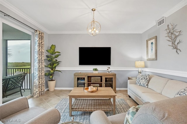 living room featuring light tile patterned flooring, crown molding, and a notable chandelier