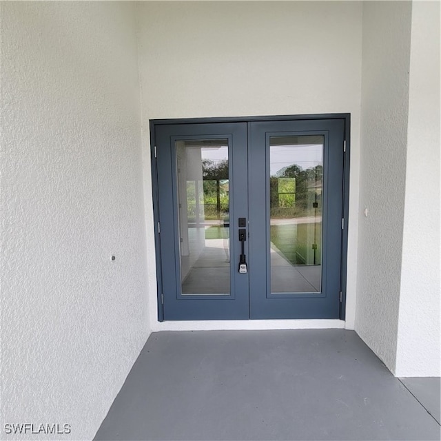 property entrance with french doors