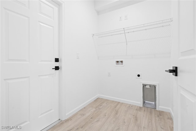 laundry room with light hardwood / wood-style floors, hookup for a washing machine, and electric dryer hookup