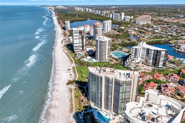 aerial view featuring a water view and a beach view