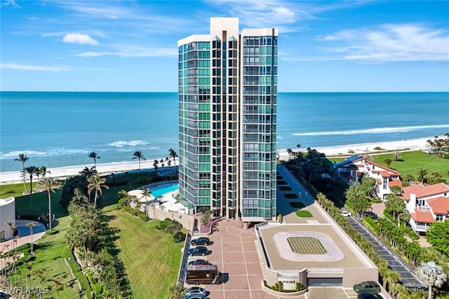 aerial view featuring a beach view and a water view