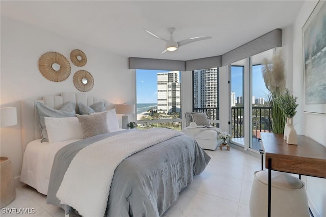 bedroom featuring access to outside and ceiling fan