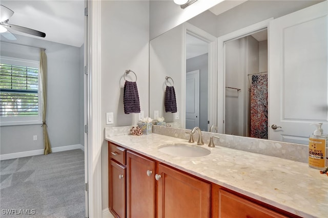 bathroom with vanity and ceiling fan