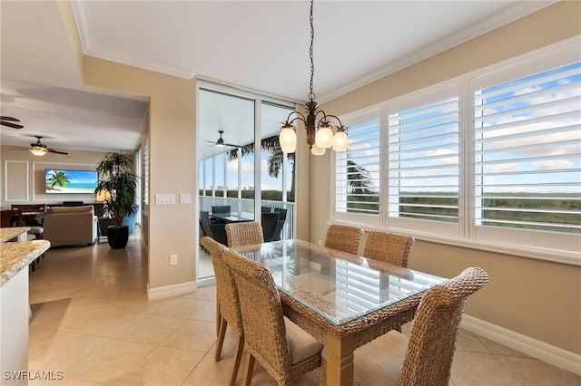 4761 W Bay Blvd Unit 403, Estero, FL 33928 - dining space with light tile patterned floors, ornamental molding, ceiling fan, and baseboards