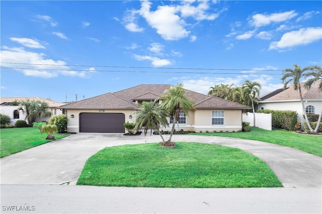 ranch-style home with a garage and a front yard