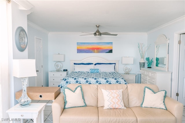 tiled bedroom with ornamental molding and ceiling fan