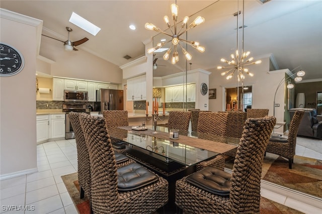 tiled dining room featuring ceiling fan with notable chandelier, high vaulted ceiling, crown molding, and a skylight