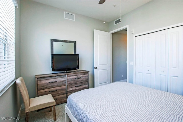 bedroom featuring carpet flooring, a closet, and ceiling fan