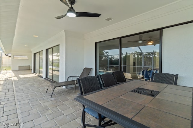 view of patio with ceiling fan