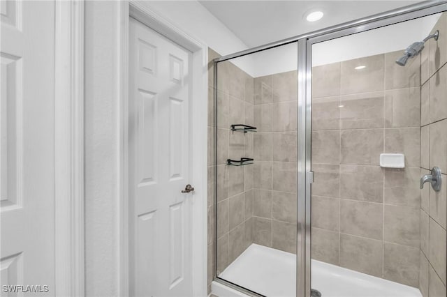 bathroom with an enclosed shower