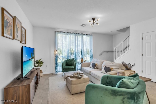 tiled living room with a chandelier