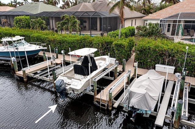 dock area featuring a water view and a lanai