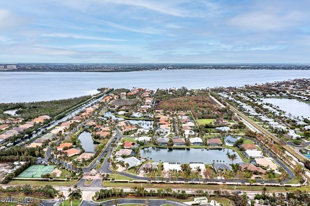 bird's eye view with a water view