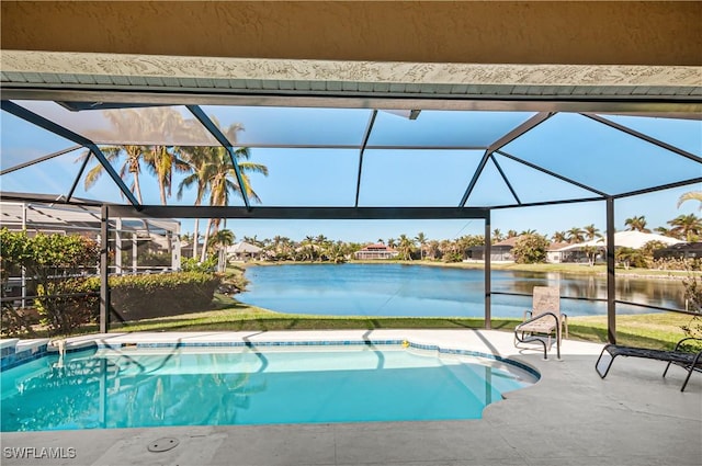 view of swimming pool with a water view, a patio area, and a lanai