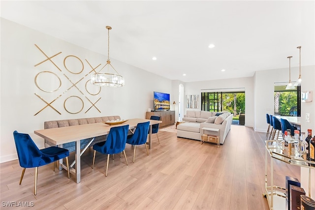 dining room featuring light hardwood / wood-style floors