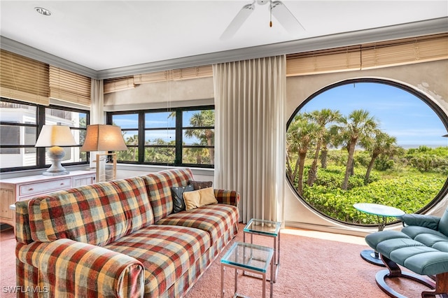 sunroom with ceiling fan