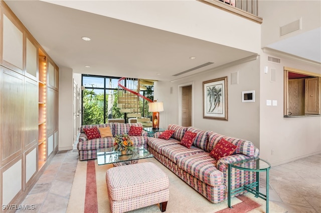 living room featuring floor to ceiling windows