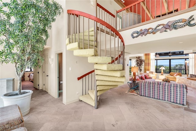 stairs with a high ceiling