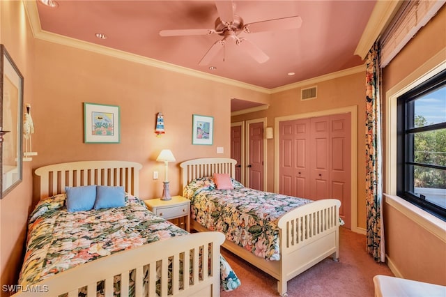 bedroom featuring carpet, ceiling fan, and crown molding