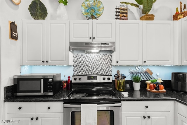 kitchen with white cabinets and appliances with stainless steel finishes