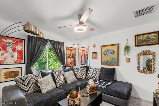 living room featuring ceiling fan