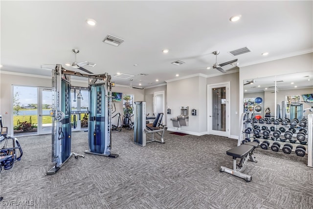 gym with carpet flooring, ceiling fan, and crown molding