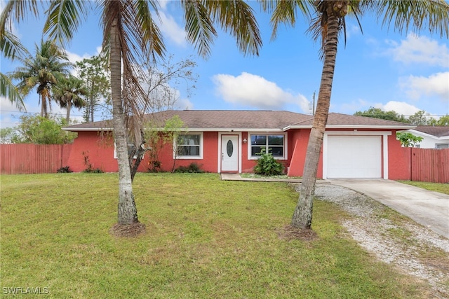 single story home with a garage and a front yard