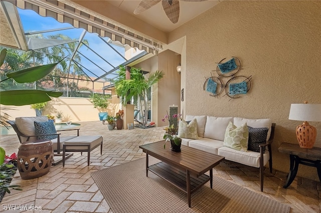 exterior space featuring ceiling fan and lofted ceiling