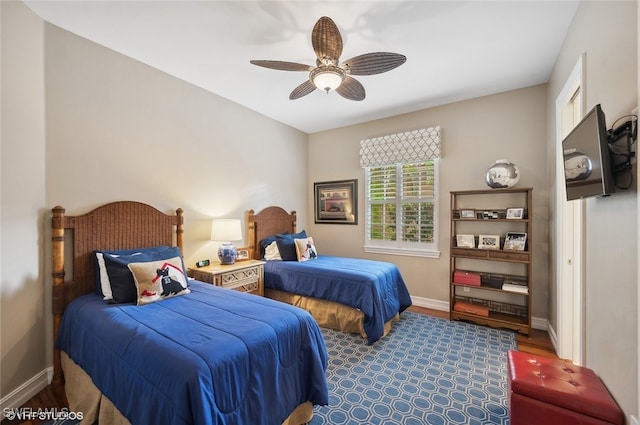 bedroom with hardwood / wood-style floors and ceiling fan