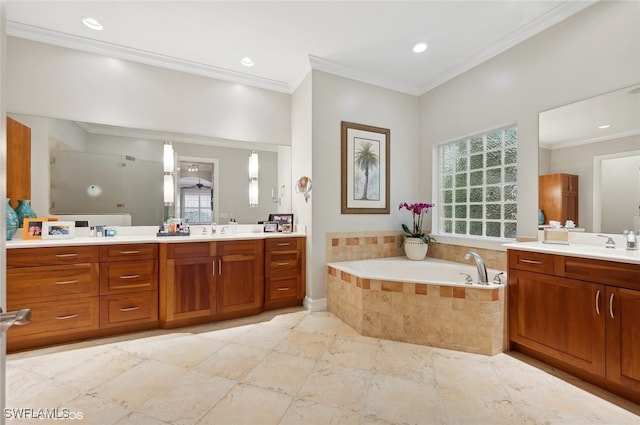 bathroom featuring vanity, a relaxing tiled tub, and crown molding