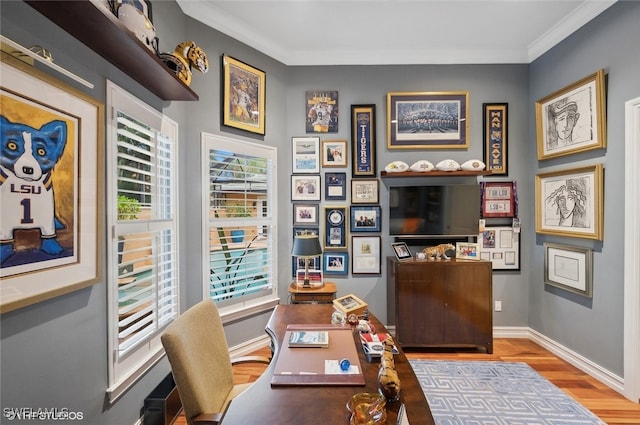 office area with crown molding and hardwood / wood-style floors