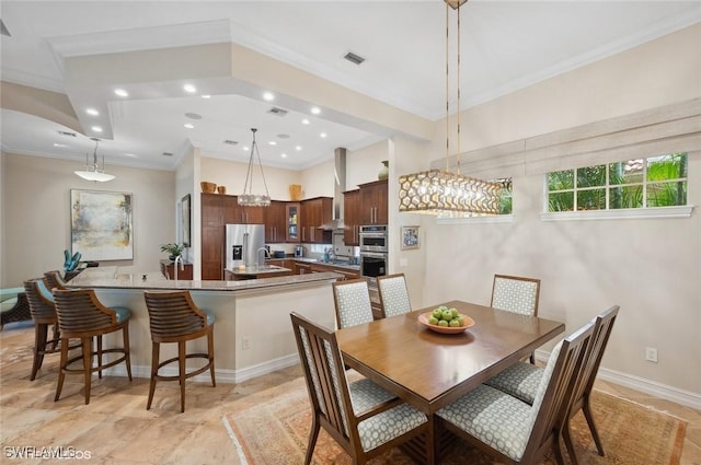 4908 Rustic Oaks Cir, Naples, FL 34105 - dining area with crown molding, recessed lighting, and baseboards