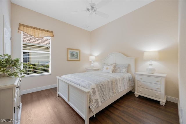 bedroom featuring ceiling fan and dark wood-type flooring