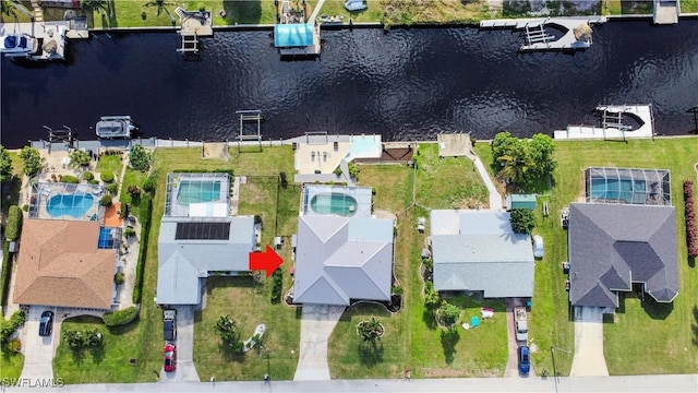 drone / aerial view with a water view