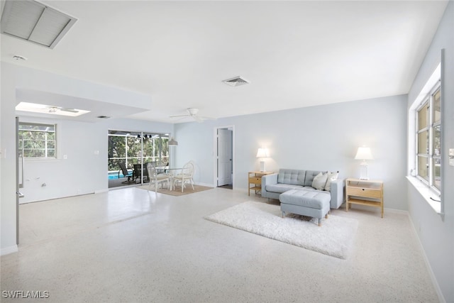 living room with ceiling fan