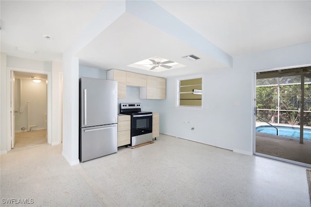 kitchen featuring stainless steel appliances and ceiling fan