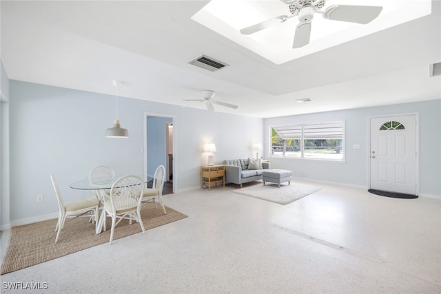 living room with ceiling fan