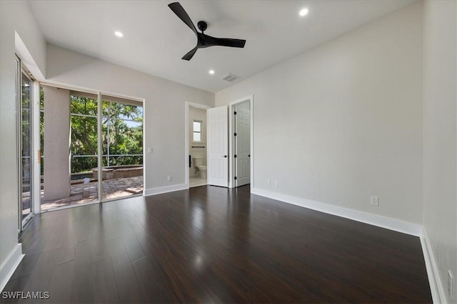 unfurnished room featuring ceiling fan and dark hardwood / wood-style flooring