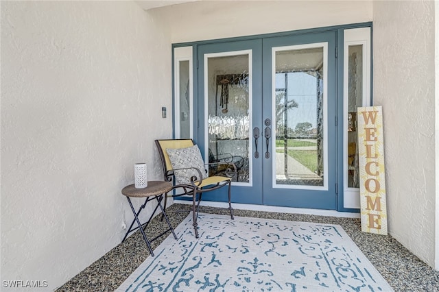 doorway to property featuring french doors