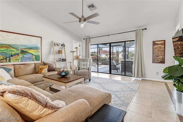 living room with high vaulted ceiling, light tile patterned floors, and ceiling fan