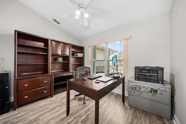 office area featuring vaulted ceiling, light hardwood / wood-style flooring, and ceiling fan