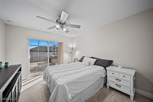 carpeted bedroom with access to outside and ceiling fan