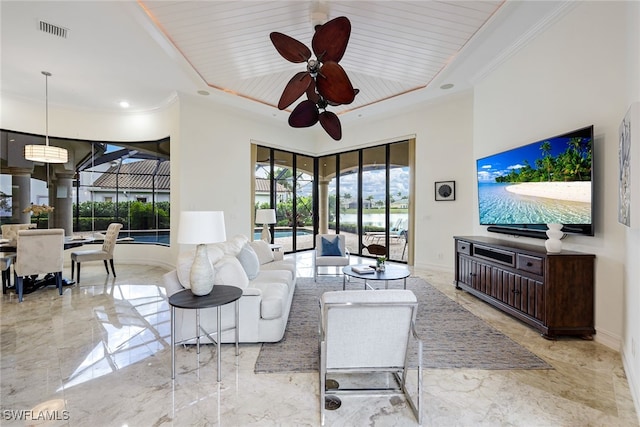 living room with wood ceiling, ceiling fan, and a towering ceiling